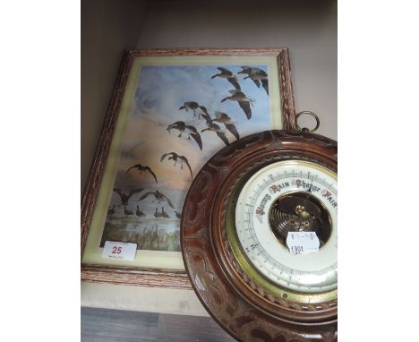 A mid 20th century aneroid barometer and a print after Peter Scott