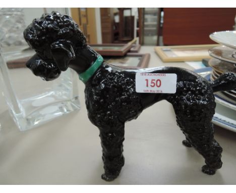 A Melba ware style figure in the form as a poodle