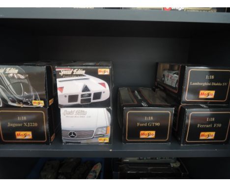 Seven Maisto Special Edition 1:18 scale die-cast sports cars including Ferrari F50, Ford GT90, all boxed