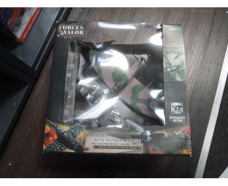 A Unimax 1:32 scale UK Spitfire MK1X, boxed