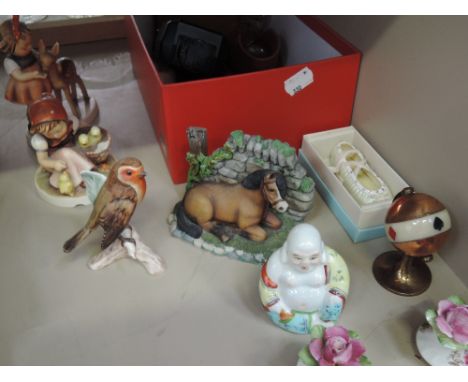 A selection of ornaments including Hummel and Goebel