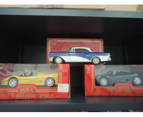 Four Mira 1:18 scale die-casts, 1955 Buick and two Ferrari and similar, all boxed