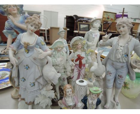 A selectionof ceramic figures, including Staffordshire and Bisque