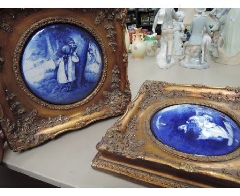 Two reproduction framed ceramic tiles