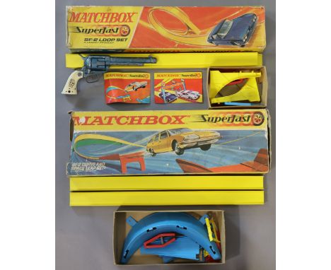 A 1950’s Lone Star “Range Ride” MKII child’s cap gun, and two matchbox superfast models “SF-2” loop set”, and “SF-3” Curve an