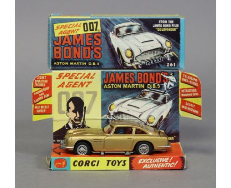 A replica corgi die-cast scale model of “james bond’s aston martin d.b.s” with secret instructions, boxed (No. 261). 