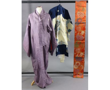 A Japanese silk-lined kimono of blue ground with multi-coloured design of an eagle to the back, with sash; &amp; a Japanese m