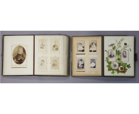 Two late 19th/early 20th century leather-bound family photograph albums containing a total of one hundred &amp; twenty-nine p