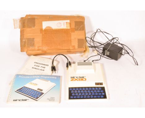 Sinclair ZX80 early computer in original posting box, with manual.  