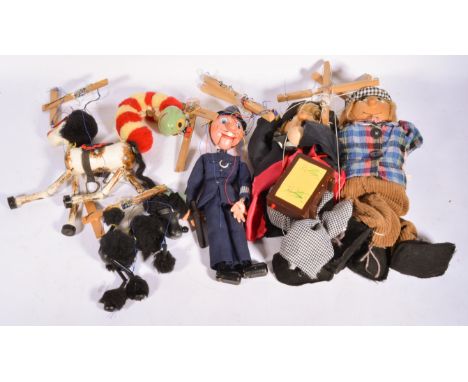 Pelham Puppets, including Policeman, Caterpillar, Donkey, Poodle and two larger similar puppet clowns, all unboxed, (6).