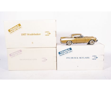 Danbury Mint detailed 1:24 scale models, 1957 Studebaker, 1953 Buick Skylark, 1965 Pontiac GTO, (3).