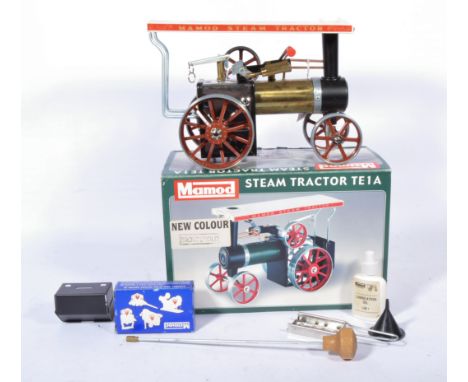 Mamod live steam TE1a Showmans engine, brown gold colour with box and parts, looks unused.