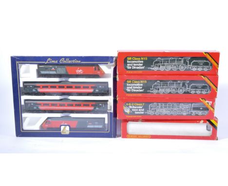00 gauge railway locomotives by Hornby, R.063 4-6-2 class 7 "Britannia" and tender, R.154 SR "Sir Dinadan" (x2), R357 LMS 4-6