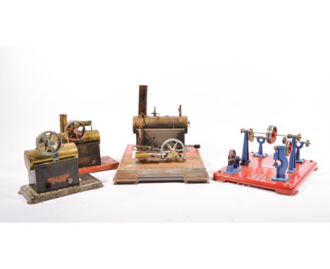 Three Mamod live steam stationary engines and a work bench unit, all unboxed.