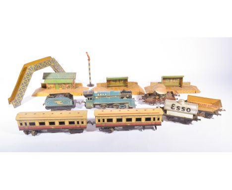 Marx tinplate locomotive train engine with wagons, coaches, along with a selection of Hornby station platforms, buildings, tr