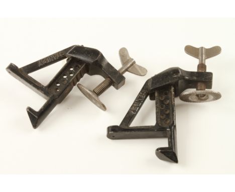 A pair of STANLEY No 203 early model bench brackets with oval pad G+
