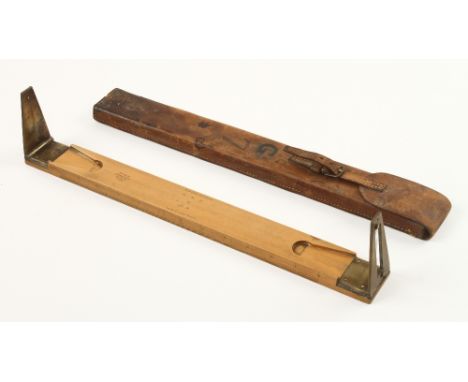 A boxwood and brass alidade by W.H.HARLING London No 1620 and dated 1912 with broad arrow in orig leather case (Jay Gaynor co
