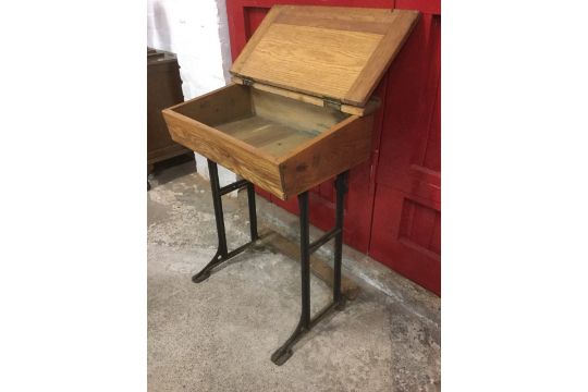 A Childs Oak School Desk The Cleated Angled Top Below A Pen