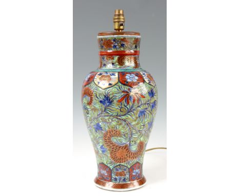 A LATE 17th CENTURY KANG HSI CHINESE VASE converted to a lamp with later polychrome decoration 40cm high