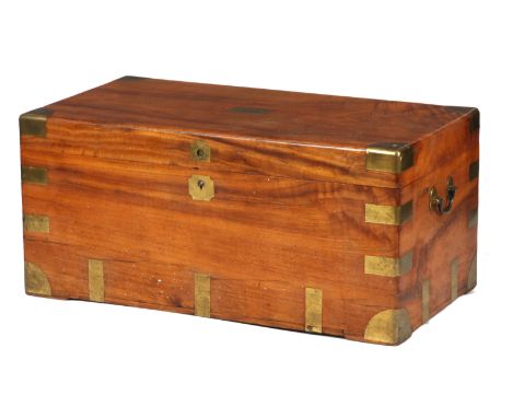 AN EARLY 19TH CENTURY BRASS BOUND CAMPHOR WOOD TRUNK with side carrying handles 92cm wide 42cm deep 41cm high.