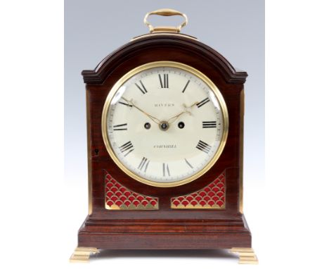 RIVERS, CORNHILL, LONDONA REGENCY MAHOGANY CASED BRACKET CLOCK the arched case with brass framed pad top and brass carrying h