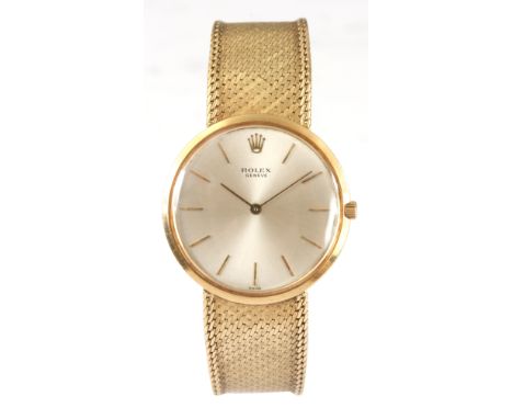 A GENTLEMAN'S 18ct GOLD ROLEX GENEVE WRIST WATCH on 18ct gold woven bracelet, the slim circular case enclosing a silvered dia