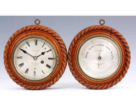 H. HUGHES 59, FENCHURCH STREET, LONDON. NO 1168 A LATE 19TH CENTURY OAK HANGING CLOCK AND BAROMETER SET with rope twist decor