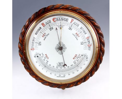 A LATE 19TH CENTURY GIANT SIZED ANEROID BAROMETER the 10&rdquo; enamel dial with painted setting and a mercury thermometer, c