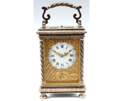 A LATE 19th CENTURY SILVERED BRASS FRENCH REPEATING CARRIAGE CLOCK with four spiral twist columns with matching handle on bun