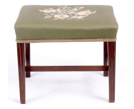 A GEORGE III MAHOGANY DRESSING STOOL WITH SQUARE TAPERING MOULDED LEGS JOINED BY A &lsquo;H&rsquo; STRETCHER having a tapestr