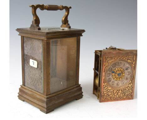 A LATE 19th CENTURY FRENCH REPEATING CARRIAGE CLOCK the brass case with square reeded columns to the corners and gilt filigre