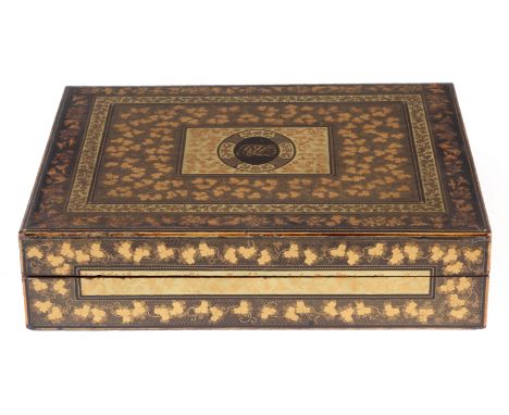 A FINE EARLY 19th CENTURY CHINESE LACQUER FITTED GAMES BOX of rectangular form decorated in gilt bird and butterflies to the 