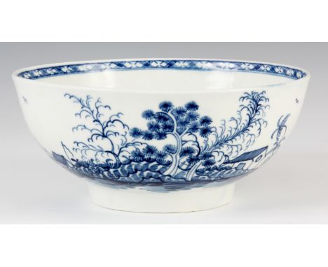 AN 18TH CENTURY BLUE AND WHITE ROCK ISLAND BLUE AND WHITE FIRST PERIOD WORCESTER BOWL 7cm high 15.5cm diameter.