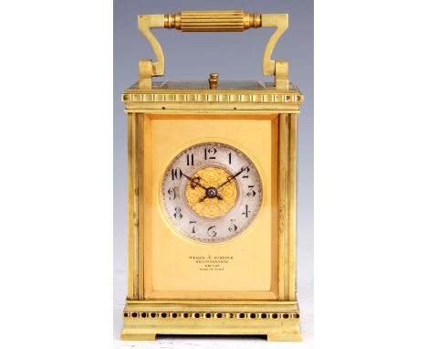 A LATE 19TH CENTURY FRENCH FIVE MINUTE REPEATER CARRIAGE CLOCK with moulded edge case and folding reeded handle, the masked d