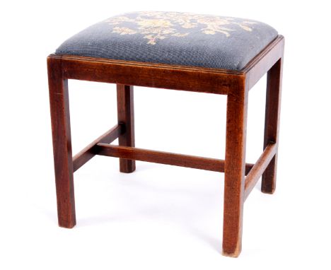 A MID 18TH CENTURY MAHOGANY RECTANGULAR STOOL with moulded&nbsp;edges standing on square mahogany legs joined by a H&nbsp;str