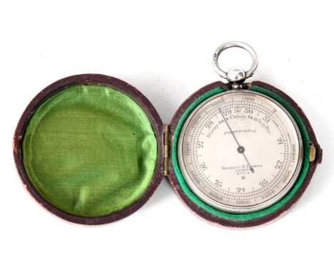 NEGRETTI & ZAMBRA, LONDON A SILVER CASED POCKET BAROMETER with engine turned decoration enclosing a silvered engraved calibra