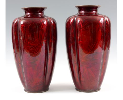 A LARGE PAIR OF EARLY 20TH CENTURY JAPANESE RED ENAMEL AND SILVER FOIL VASES decorated with cranes and bamboo shoots 25cm hig