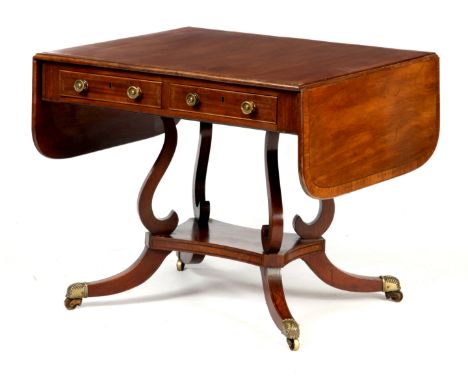 A REGENCY BRASS INLAID MAHOGANY SOFA TABLE with drop down ends and freize&nbsp;drawers, fitted brass knob handles with dummy 