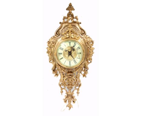 A LATE 19th CENTURY FRENCH ORMOLU CARTEL CLOCK with rococo style case enclosing a 5" enamel dial with Roman chapter ring and 