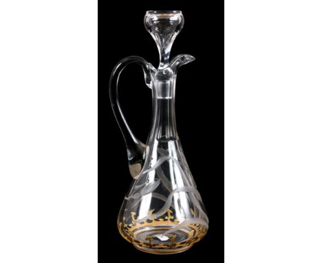 A STYLISH CLEAR GLASS MOSER DECANTER with etched floral and  gilt decoration 31.5cm high.
