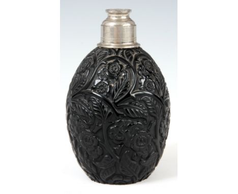 AN UNUSUAL ART DECO BLACK GLASS PERFUME DECANTER engraved with flowerhead and leaf decoration signed to the base B S 12cm hig