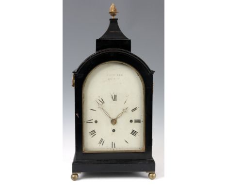 GEORGE TYLER, LONDON A GEORGIAN EBONISED TRIPLE FUSEE QUARTER CHIMING BRACKET CLOCK the arch top case with pediment top above