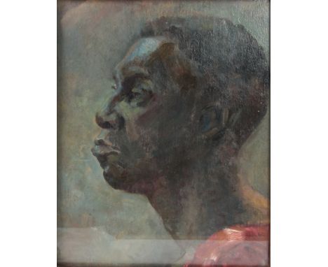 AN EARLY 20TH CENTURY OIL ON BOARD side portrait of an African Man 34cm high 27cm wide - in a glazed oak moulded frame.
