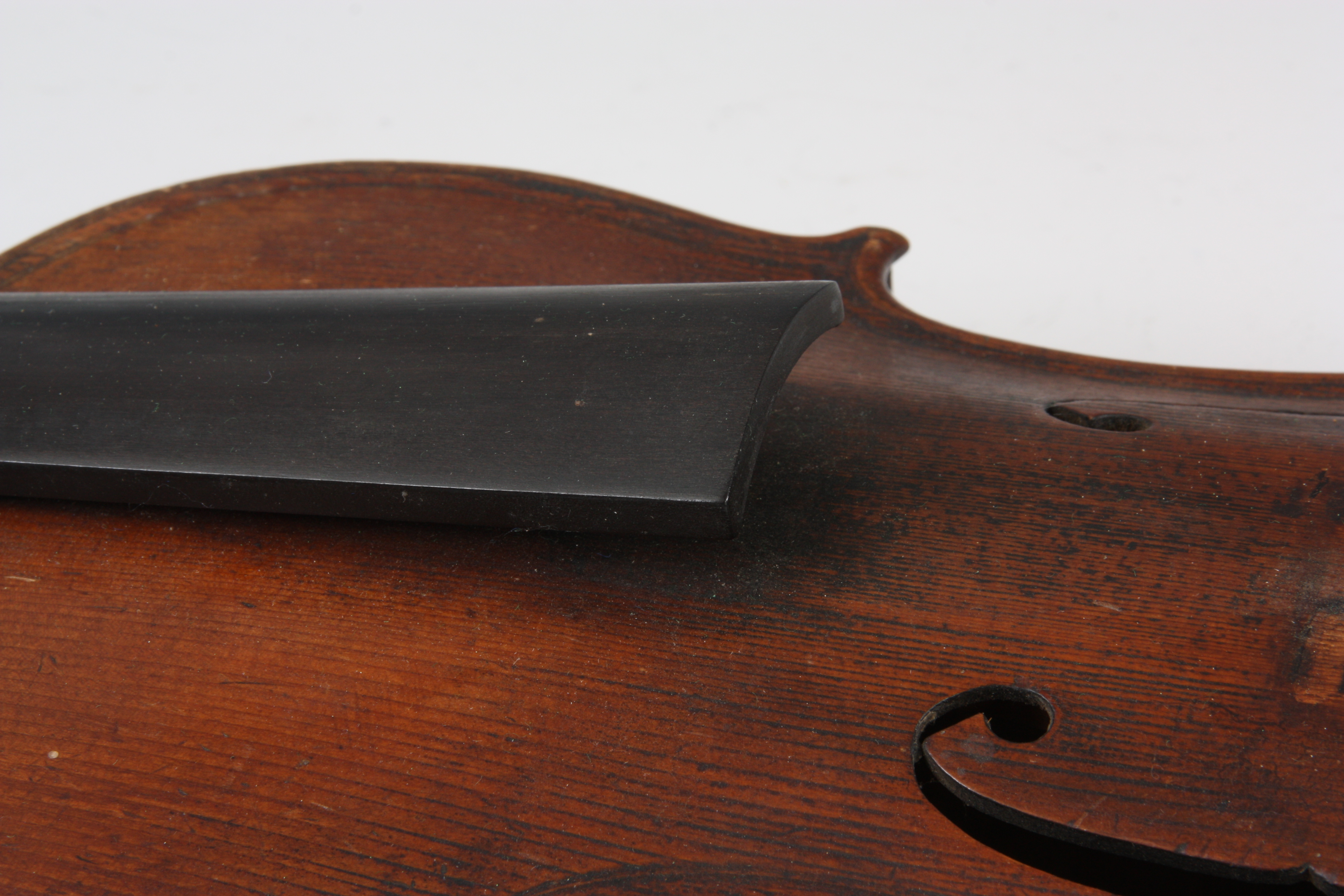 AN ANTIQUE VIOLIN with two piece back and double purfling, label reads