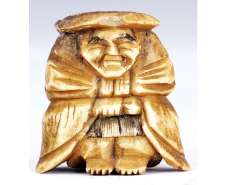 A JAPANESE BONE NETSUKE of an oriental man wearing a hat.