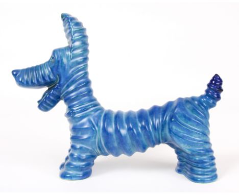 A CARLTONWARE RIBBED PORCELAIN COMICAL DOG with blue glaze and stamped underneath 20cm wide 15.5cm high.