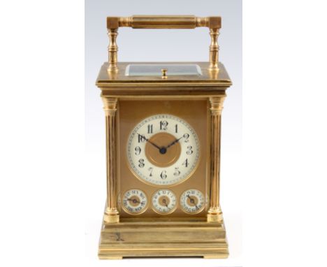A LATE 19th CENTURY FRENCH REPEATING CARRIAGE CLOCK WITH CALENDAR WORK AND ALARM the brass case with four reeded columns on s
