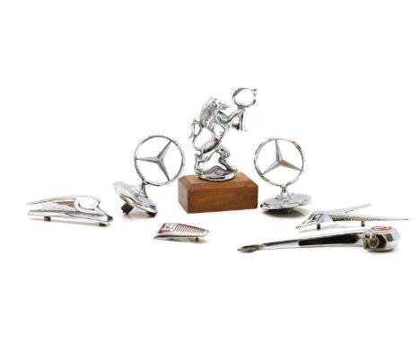 A Daimler 250 Sovereign bonnet mascot, chromium-plated,13.5cm long,a Morris Minor bonnet mascot,21cm long,a Vauxhall radiator