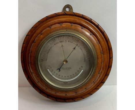 A 20th century oak cased wall barometer by Dolland, London 