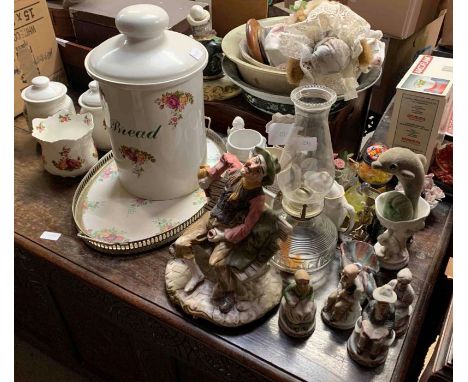 A collection of miscellaneous items including a ceramic bread bin 